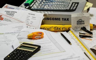 tax calculator among several tax papers